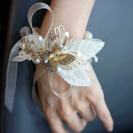 Corsage de poignet vintage papillon doré et perle