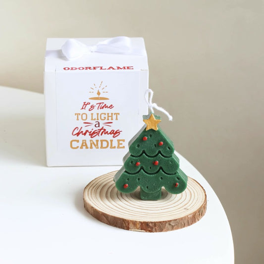 Bougie parfumée sapin de Noël et petit bonhomme en pain d'épices