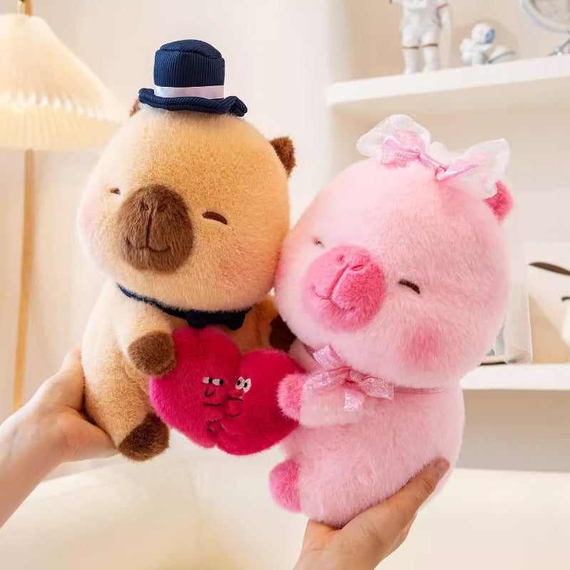 Couple de capybaras en peluche mariés