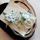 Load image into Gallery viewer, Lily of the Valley Wrist Corsage Boutonniere Set