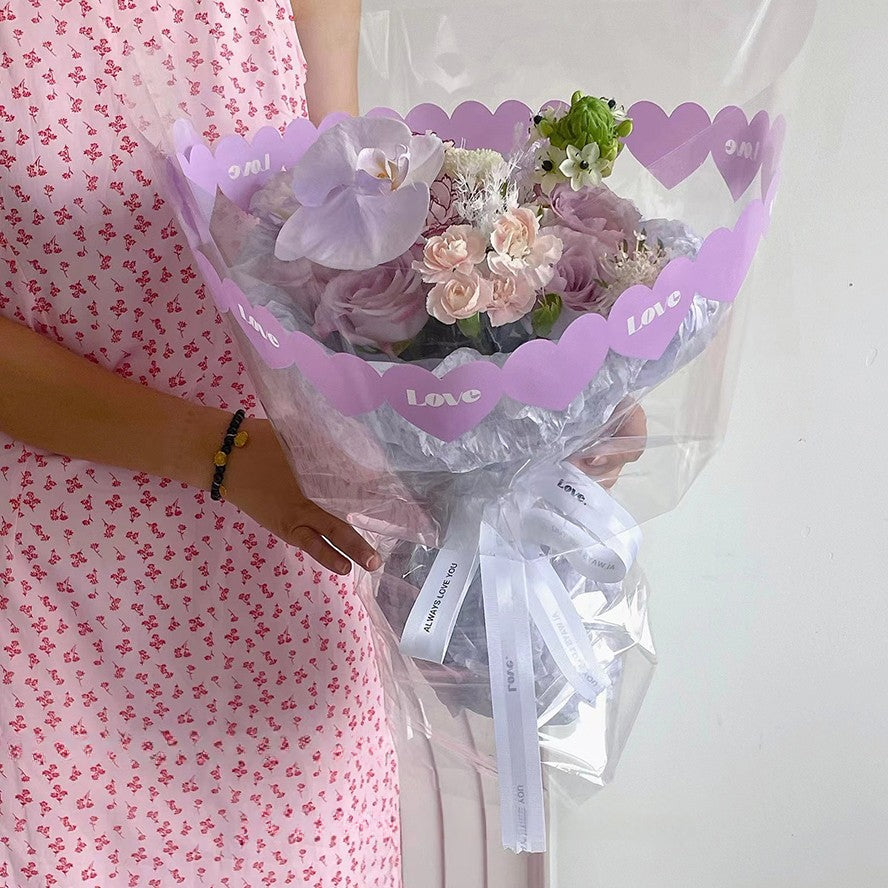 20 feuilles de papier cadeau cellophane transparent LOVE (58x58 cm)