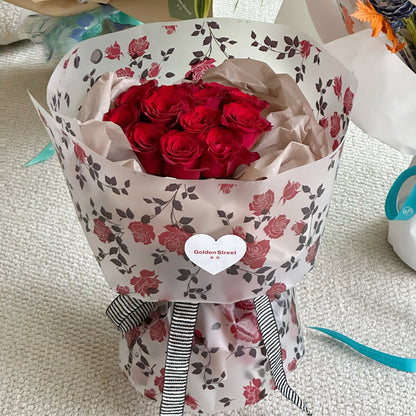 20 feuilles de papier cadeau cellophane à motif floral rose (58x58 cm)