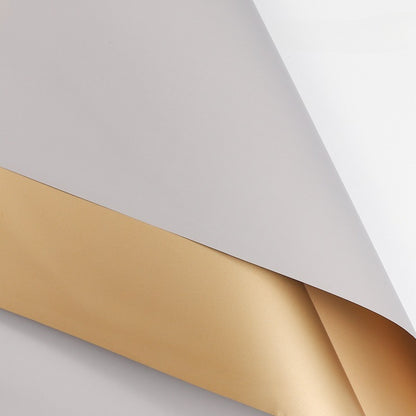 20 feuilles de papier cadeau bicolore doré (56x56 cm)