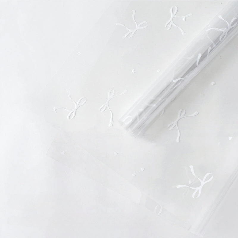 20 feuilles de papier cellophane transparent à motif nœuds (57x57cm)