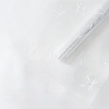 20 feuilles de papier cellophane transparent à motif nœuds (57x57cm)