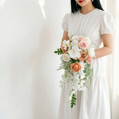 Bouquet de mariée en cascade terre cuite et vieux rose