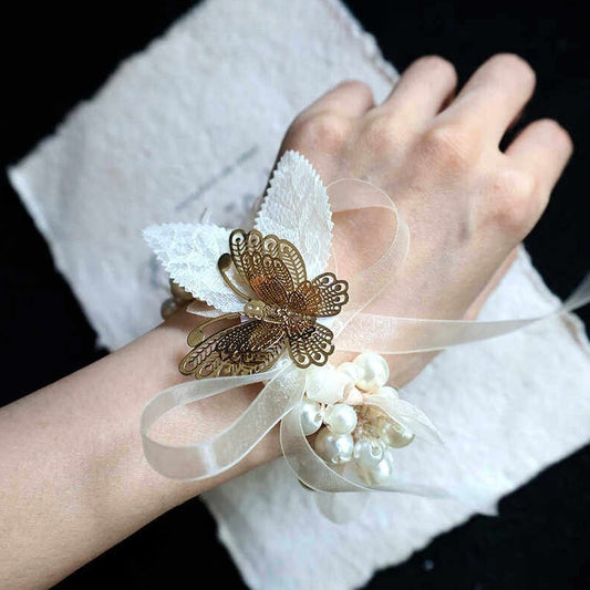 Corsage de poignet vintage papillon doré et perle