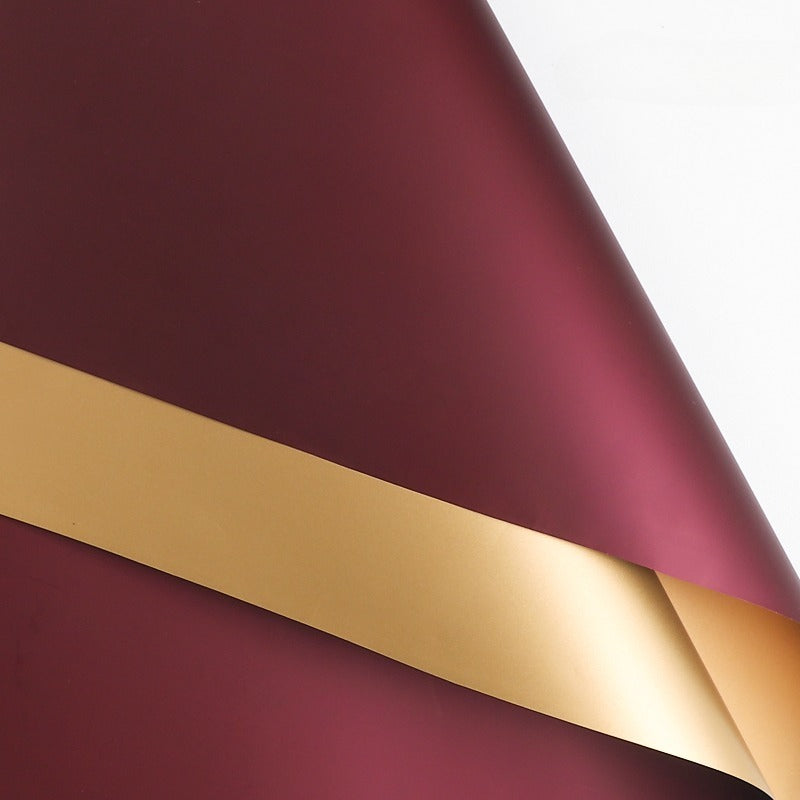 20 feuilles de papier cadeau bicolore doré (56x56 cm)