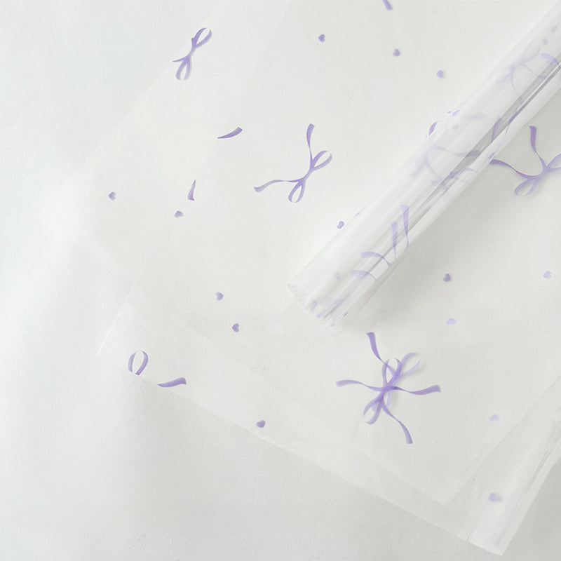 20 feuilles de papier cellophane transparent à motif nœuds (57x57cm)