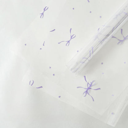 20 feuilles de papier cellophane transparent à motif nœuds (57x57cm)
