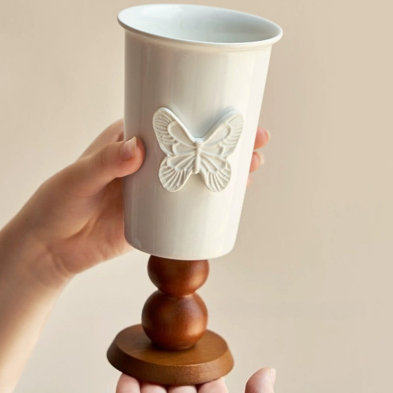 White Ceramic Pedestal Vase with Wooden Base