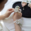(boutonniere + wrist corsage) white