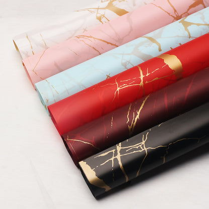 20 feuilles de cellophane marbré doré pour bouquets (57x57 cm)
