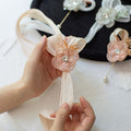 (boutonnière + bracelet de fleurs) rose