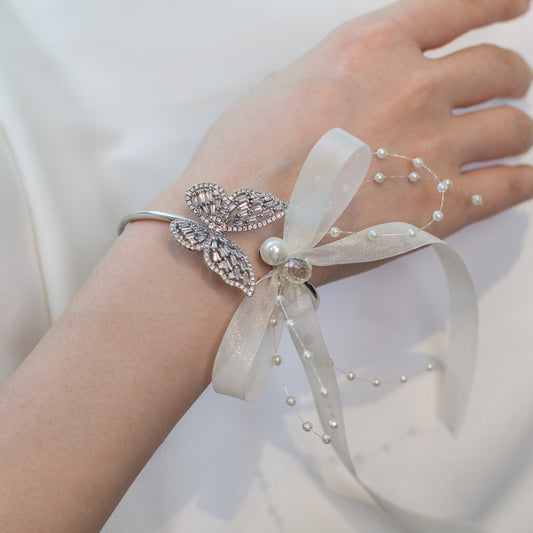 Corsage de poignet papillon en strass étincelants