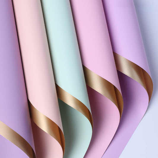 20 feuilles de papier cadeau bicolore doré (56x56 cm)