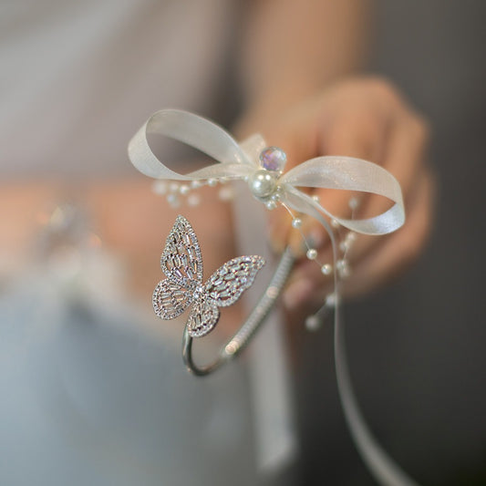 Corsage de poignet papillon en strass étincelants