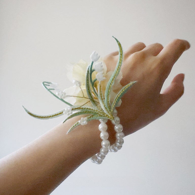 white lily of the valley corsage Lily of the Valley Bridesmaids Wrist Corsages