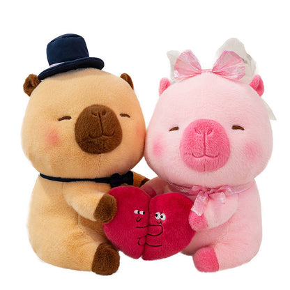 Couple de capybaras en peluche mariés