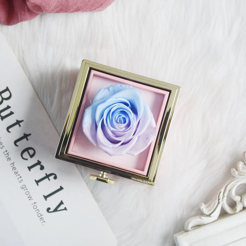 Boîte à bijoux rotative à 360° en velours avec rose éternelle