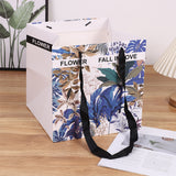Charger l'image dans la galerie, Lot de 10 sacs cadeaux carrés à fond large motif tropical