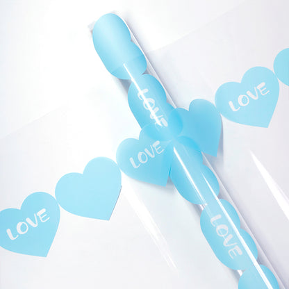 20 feuilles de papier cadeau cellophane transparent LOVE (58x58 cm)