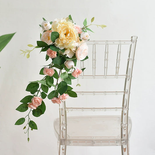 Fleurs artificielles pour la décoration des chaises de mariage