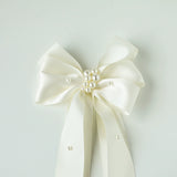 Load image into Gallery viewer, Ivory Satin Bow with Pearl Accents