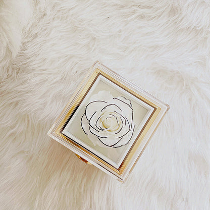 Boîte à bijoux rotative à 360° en velours avec rose éternelle