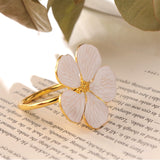 Load image into Gallery viewer, Delicate Metal Flower Napkin Rings (Set of 6)
