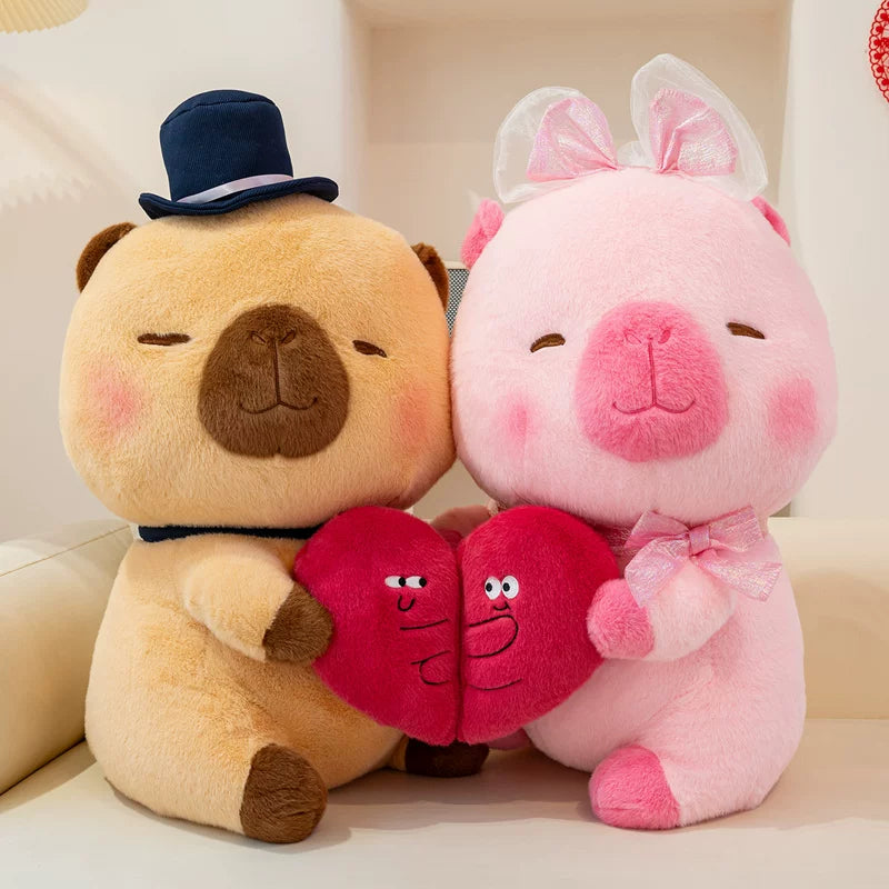 Couple de capybaras en peluche mariés