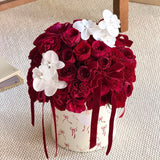 Load image into Gallery viewer, Set of 2 Red Bow Print Round Floral Gift Boxes