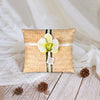 sac + ruban + fleur verte + étiquette