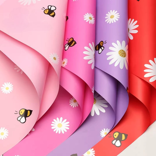 20 feuilles de papier d'emballage pour bouquet motif marguerites et abeilles (57x57cm)