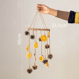 Load image into Gallery viewer, Dried Orange Slices Pinecones Nature Wind Chime