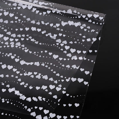 20pcs Heart Wave Cellophane Wrap (57x57cm)