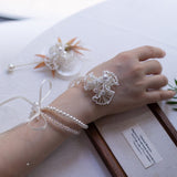 Load image into Gallery viewer, Pearl Beaded Wrist Corsage Boutonniere Set