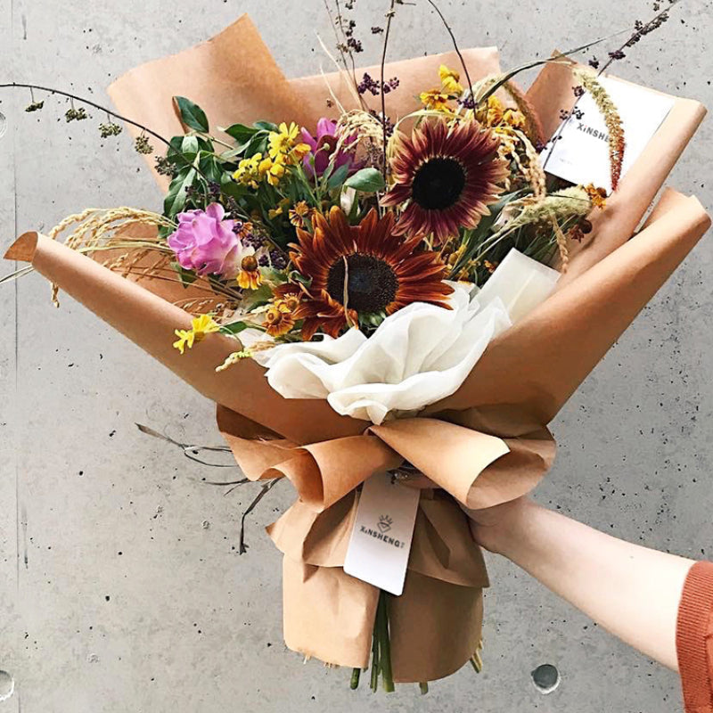 Where to get a flower bouquet wrapped in brown paper? Most places