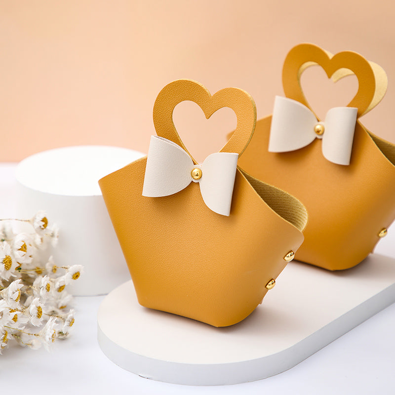 Sachet cadeau pour invités avec poignée cœur, lot de 20 (6x5x16cm)