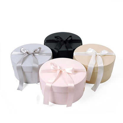 Grande boîte cadeau avec nœud ruban