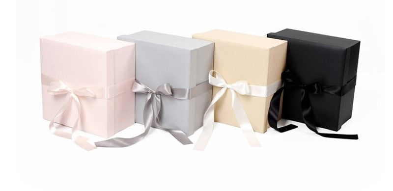 Grande boîte cadeau avec nœud ruban